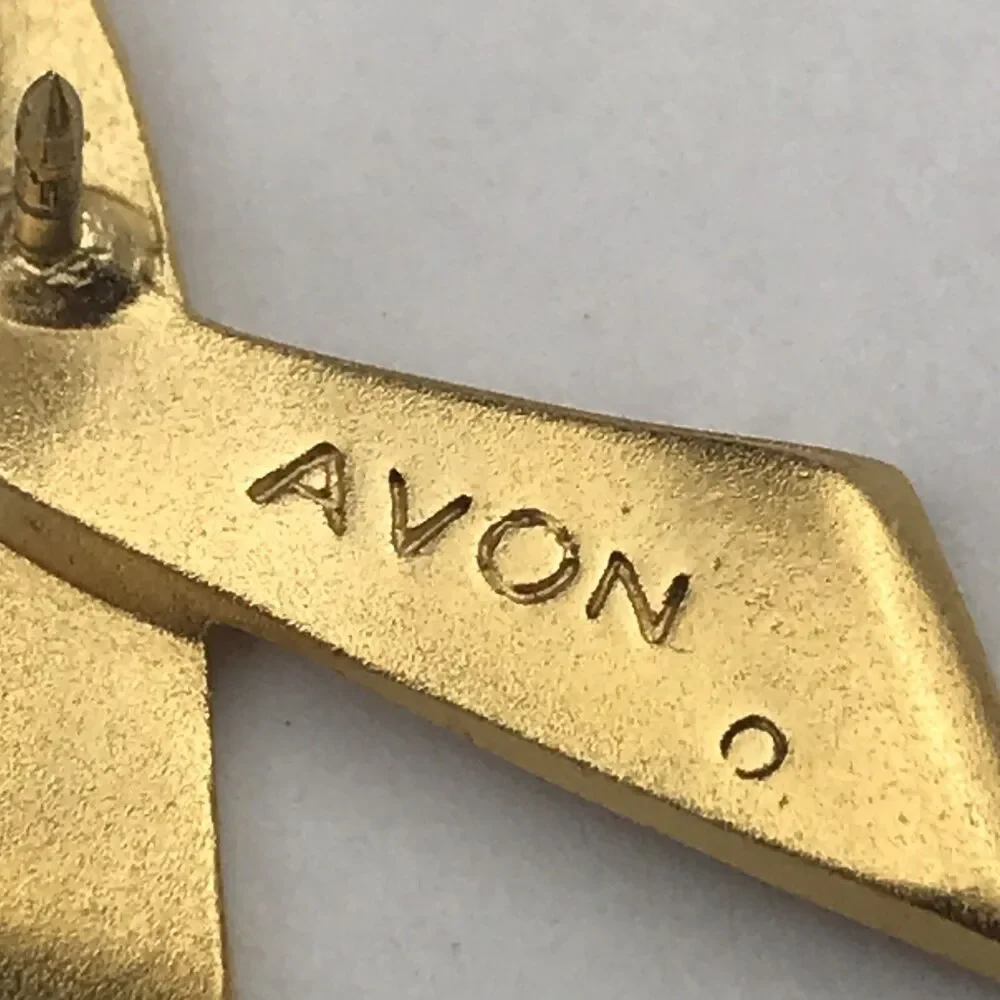 Avon pin pink